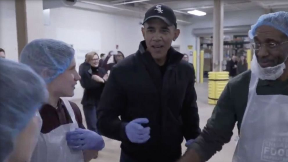 PHOTO: Barack Obama greeted volunteers at the Greater Chicago Food Depository in Chicago on Wednesday, Nov. 21, 2018.