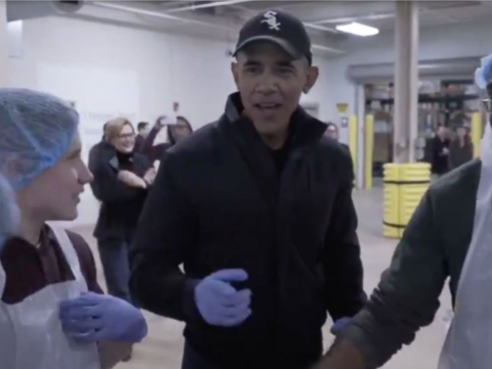 PHOTO: Barack Obama greeted volunteers at the Greater Chicago Food Depository in Chicago on Wednesday, Nov. 21, 2018.