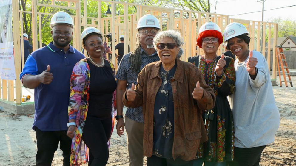 PHOTO: Opal Lee, known as the grandmother of Juneteenth, participates in a wall raising ceremony for her new home in Fort Worth, Texas on March 21, 2024.