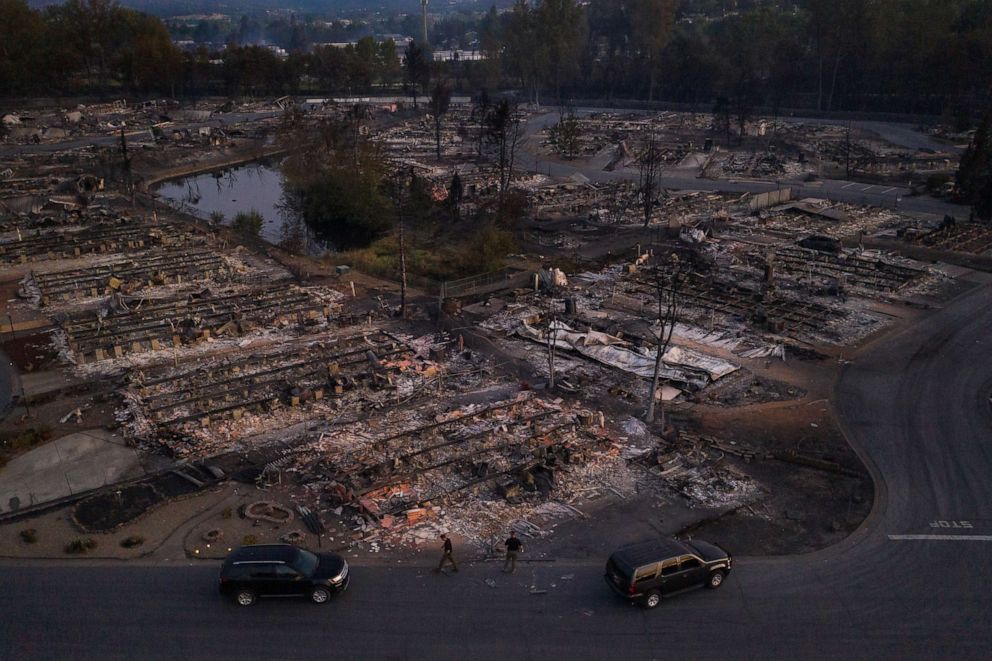 PHOTO: Security officials survey the Bear Lakes Estates neighborhood which was left devastated by the Almeda fire in Phoenix, Oregon, U.S., September 9, 2020.