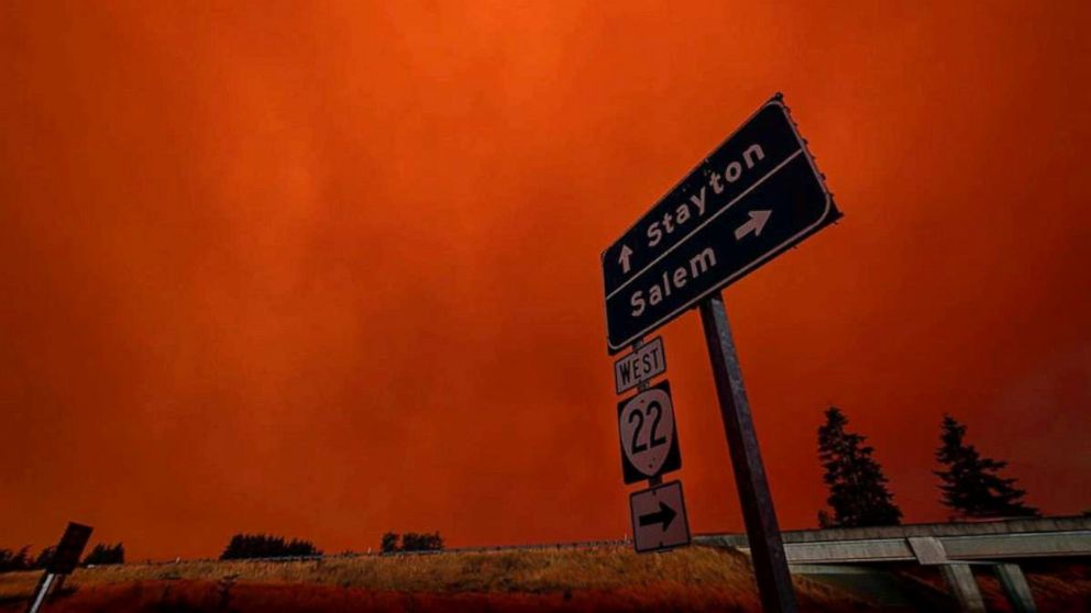 PHOTO: Red sky and thick smoke are seen in Salem City, Oregon, U.S., September 8, 2020, in this picture obtained from social media. Picture taken September 8, 2020.