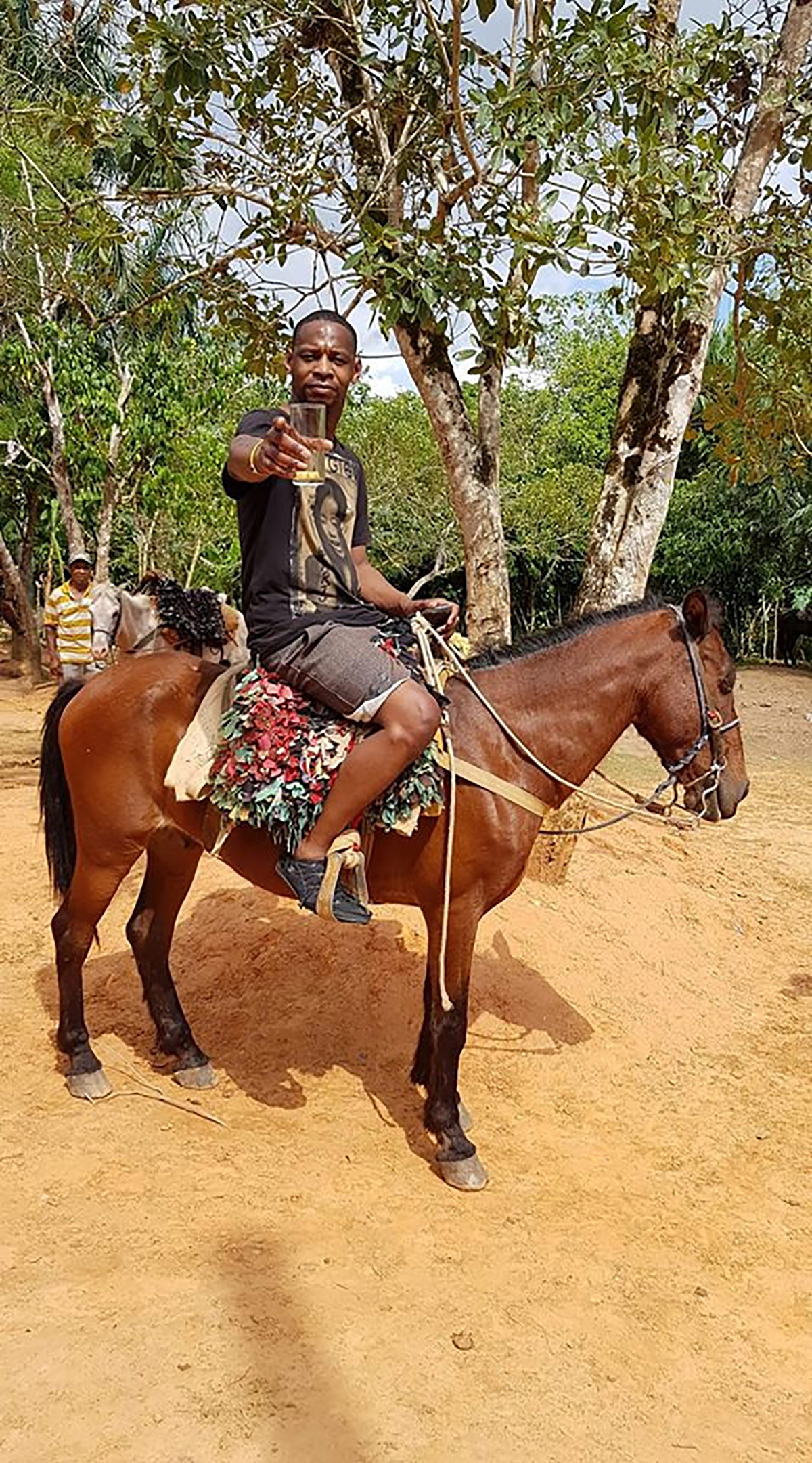PHOTO: Orlando Moore, seen on horseback, is seen in this image taken March 26, 2019 at the waterfall of El Limon, Samana, Dominican Republic.