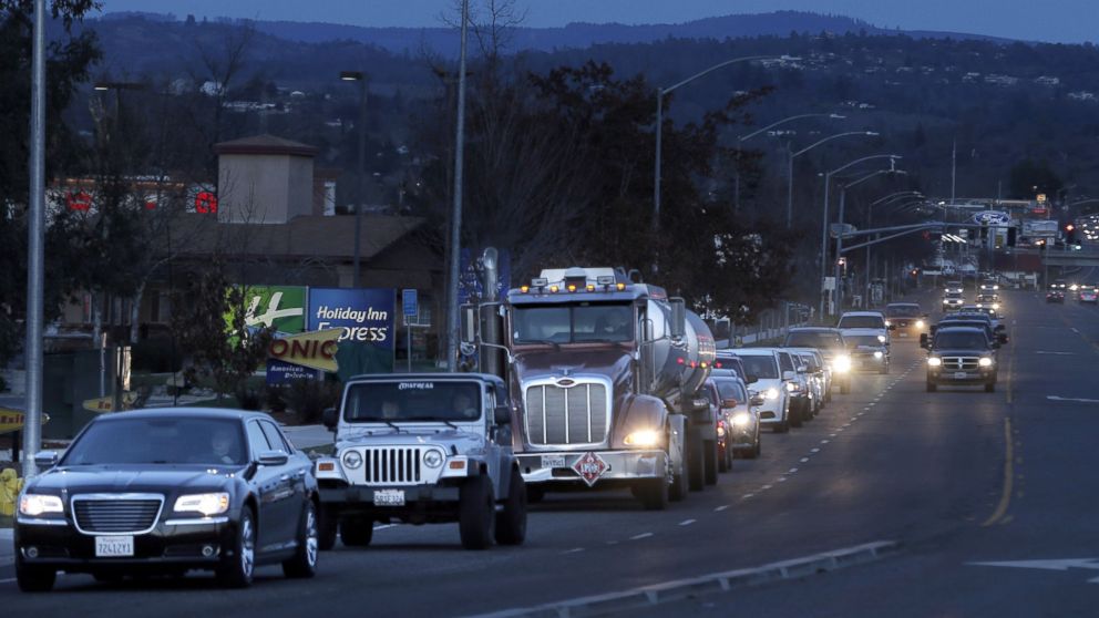 PHOTO: Vehicles line up on Highway 162 as thousands of Oroville residents evacuated the city following fears that erosion near the auxiliary spillway at Oroville Dam would cause it to fail, February 12, 2017. 