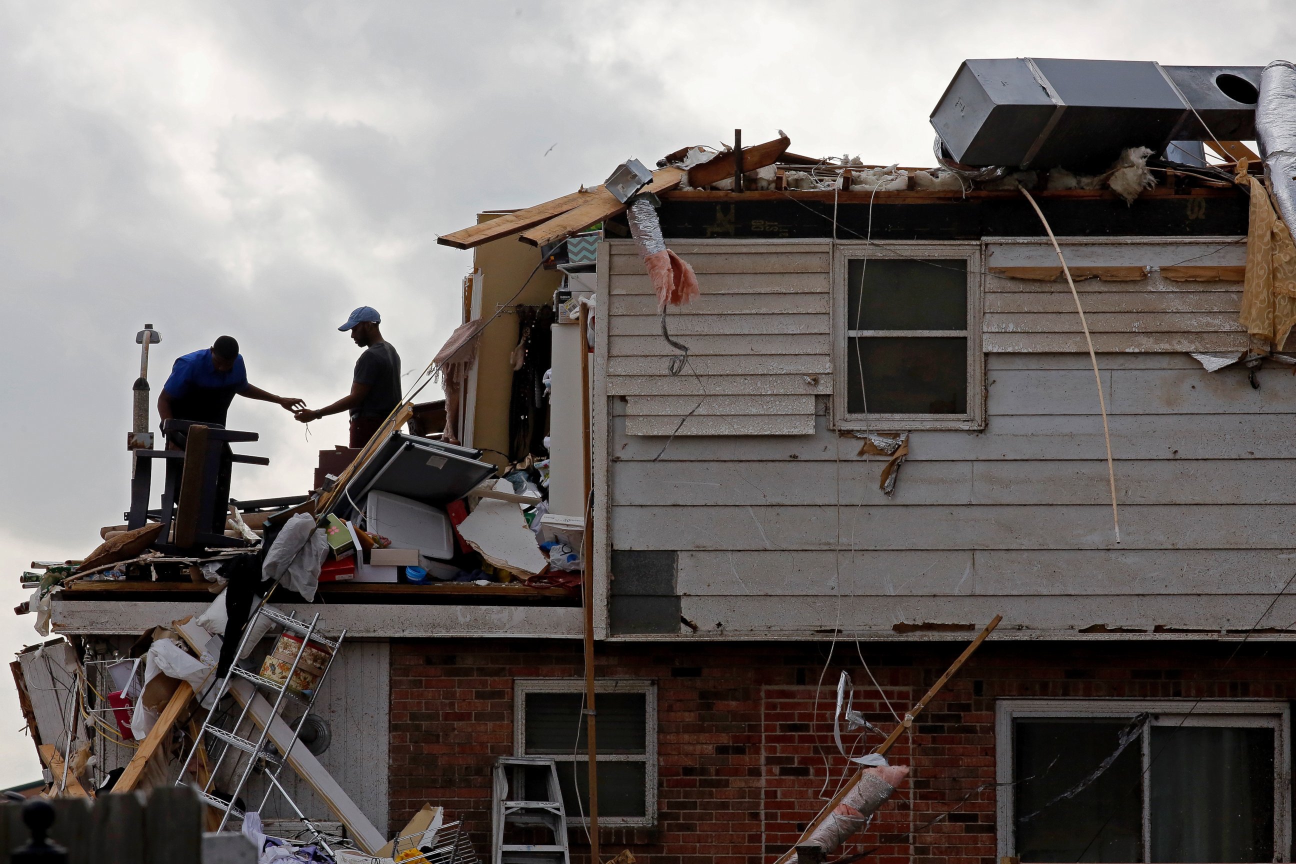 PHOTO: Personal belongings are salvaged from a tornado damaged home in East New Orleans, Louisiana after a tornado touched down leaving many homeless, February 7, 2017. 