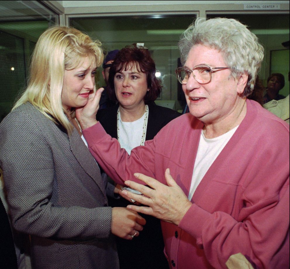 PHOTO: Laverne Pavlinac, right, touches the tear-stained face of her grandaughter, Nicole Sullivan, after being released from prison in Salem, Ore., Nov. 27, 1995. 