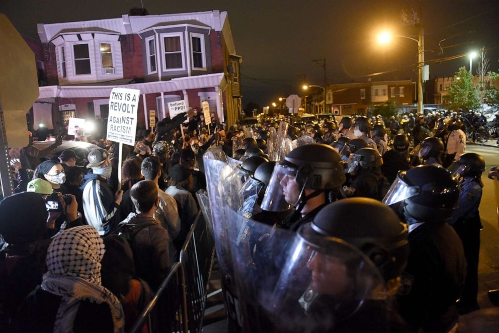 PHOTO: Protesters face off with police during a demonstration Tuesday, Oct. 27, 2020, in Philadelphia. Hundreds of demonstrators marched in West Philadelphia over the death of Walter Wallace Jr., a Black man who was killed by police on Monday. 