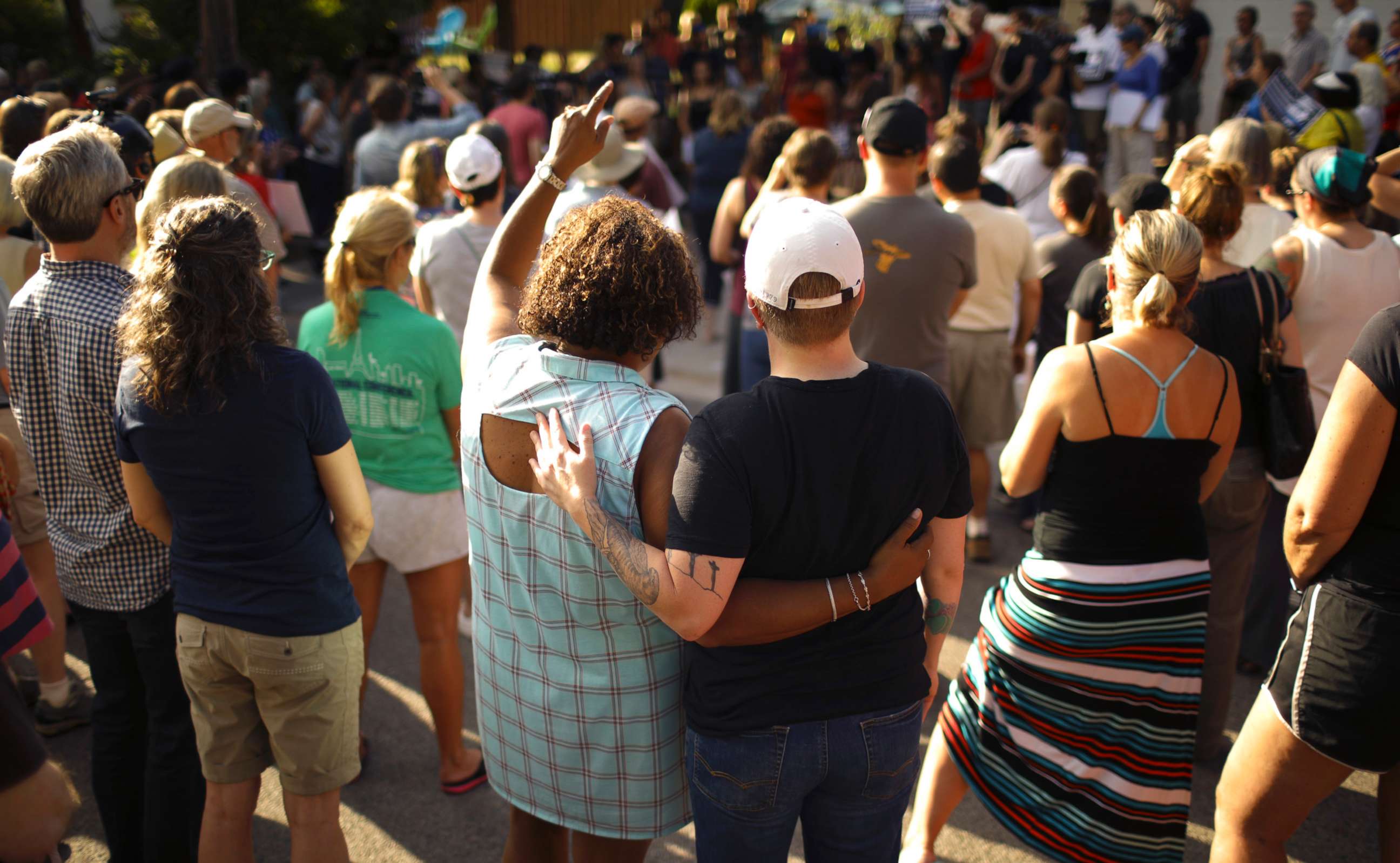 PHOTO: A crowd gathers to remember an Australian woman who was shot and killed late Saturday by police, Sunday evening, July 16, 2017, in Minneapolis. 