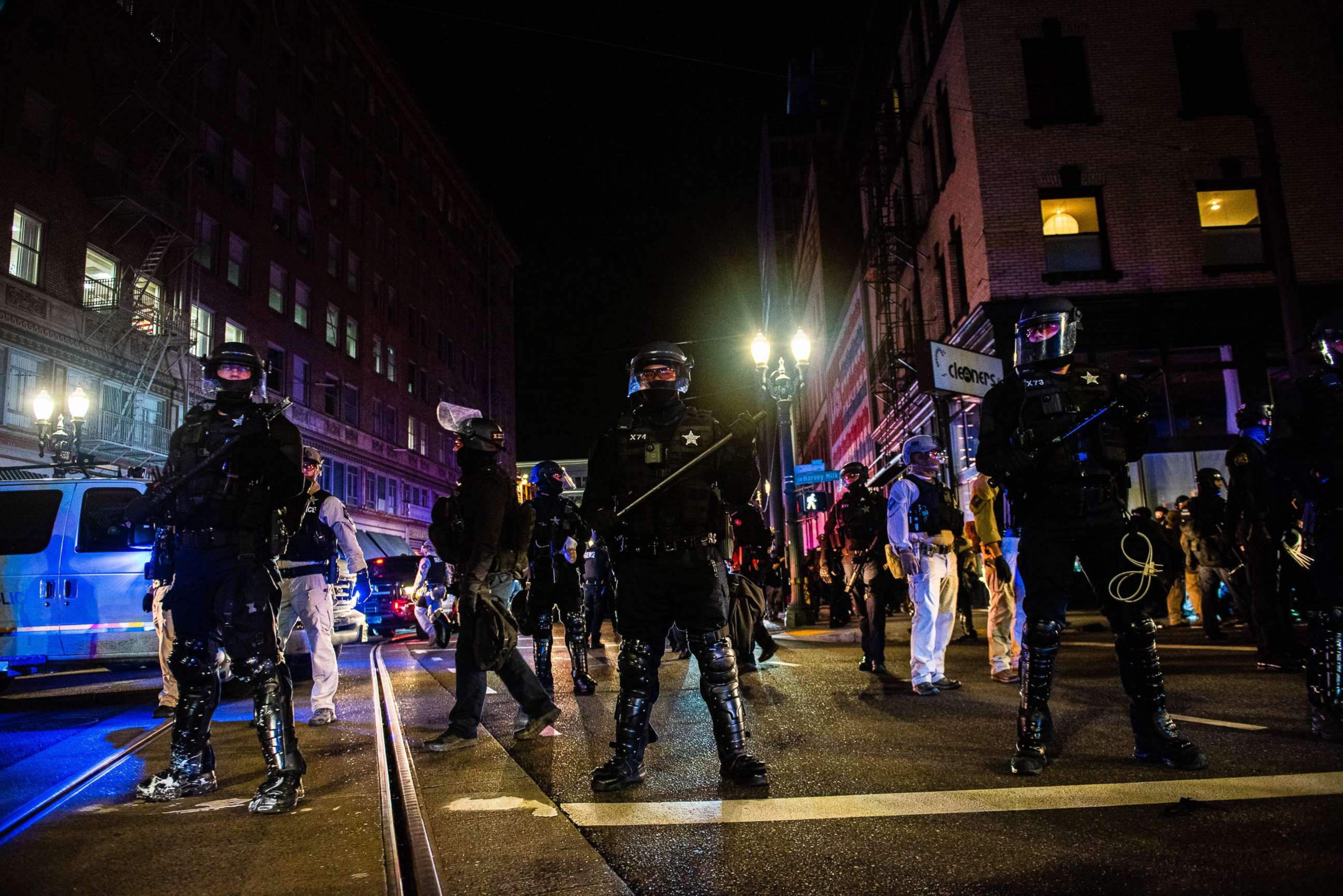 PHOTO: TOPSHOT - Oregon State Troopers block a street as they confront protesters in Portland, Oregon on November 4, 2020, during a demonstration called by the "Black Lives Matter" movement, a day after the US Presidential Election. 