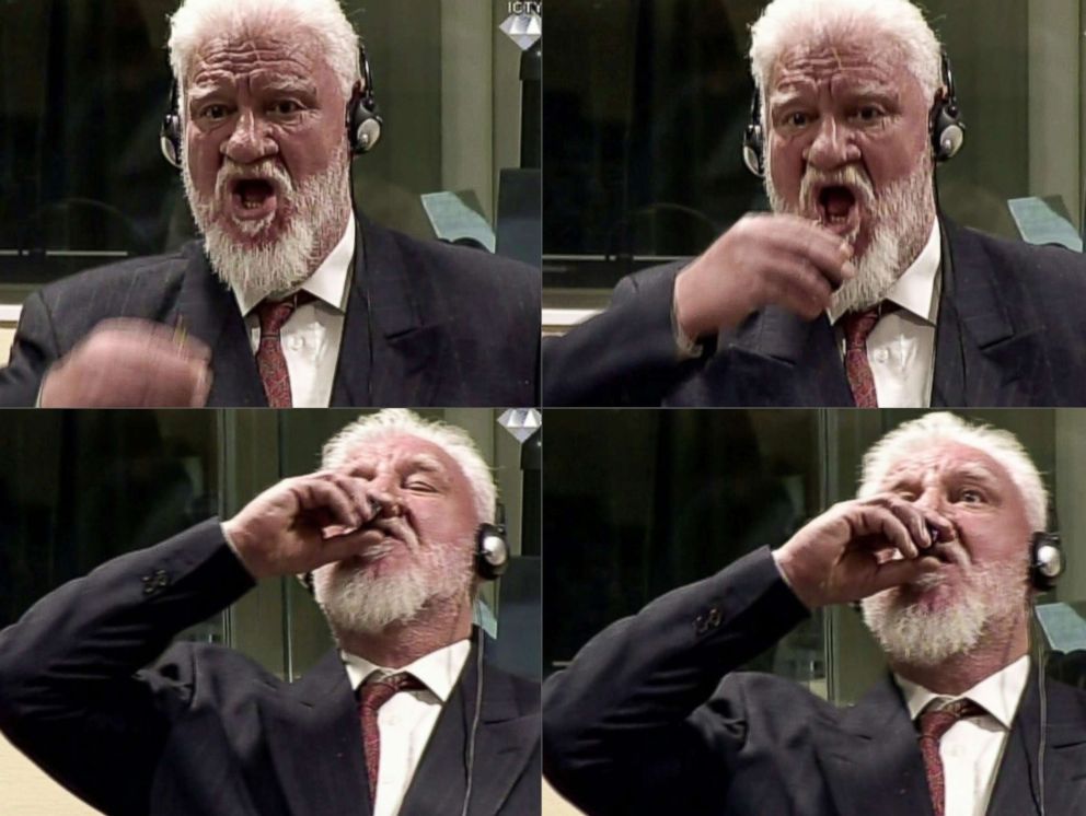 PHOTO: Former general Slobodan Praljak swallowing what is believed to be poison, during his judgement at the UN war crimes court to protest the upholding of a 20-year jail term, Nov. 29, 2017.