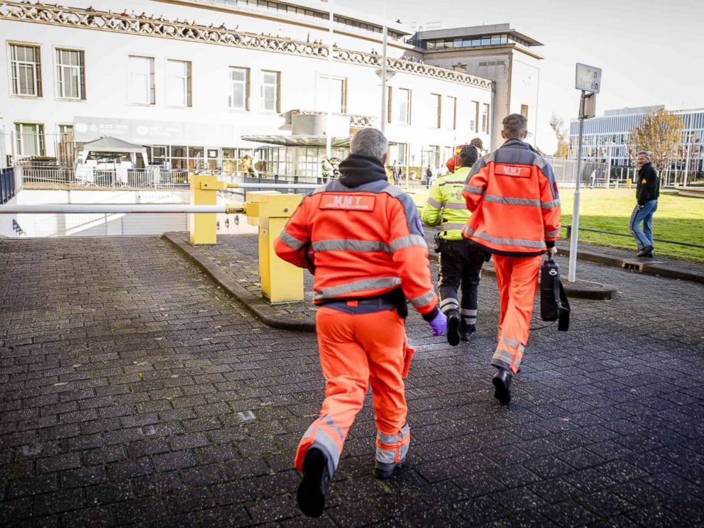 PHOTO: Emergency Services staff run near the International Criminal Tribunal for the former Yugoslavia (ICTY) in The Hague, Nov. 29, 2017, after Slobodan Praljak apparently drank poison upon hearing his 20-year sentence was upheld. 
