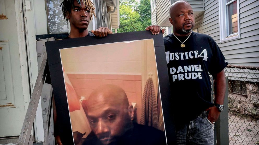 PHOTO: Armin Prude, left, and Joe Prude hold an enlarged photo of Daniel Prude, Sept. 3, 2020, who died following a police encounter, in Rochester, N.Y. 