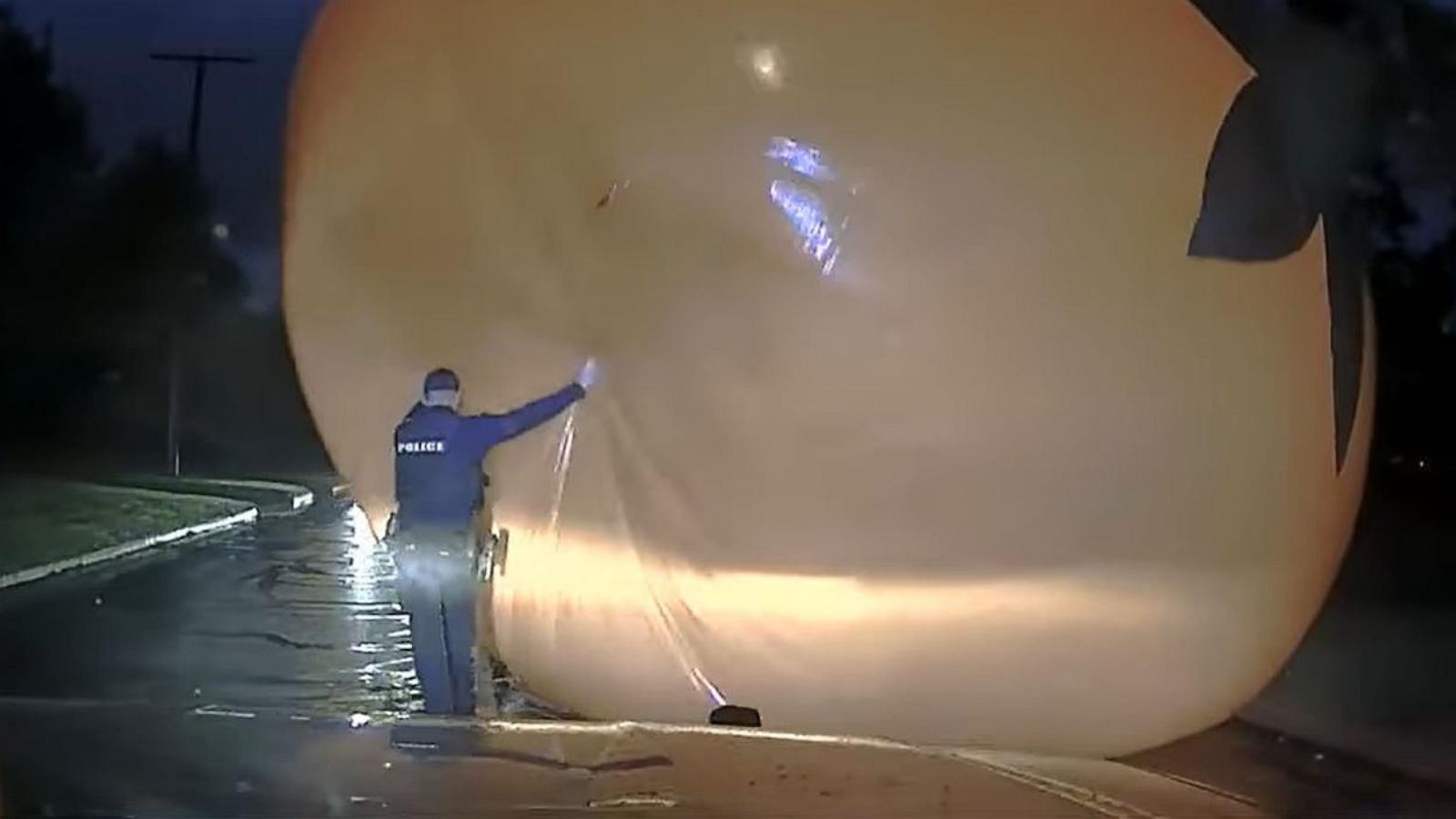 Cop 'attacked' by giant inflatable runaway Halloween pumpkin in middle of  the street - ABC News