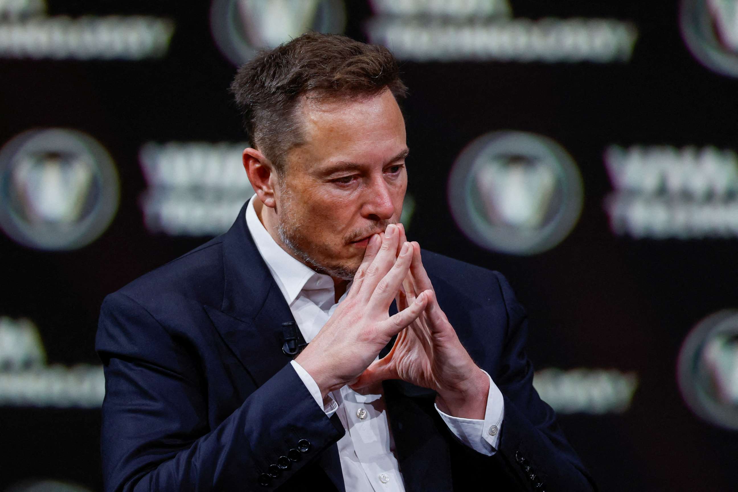 FILE PHOTO: Elon Musk, Chief Executive Officer of SpaceX and Tesla and owner of Twitter, gestures as he attends the Viva Technology conference dedicated to innovation and startups in Paris, France, June 16, 2023. REUTERS/Gonzalo Fuentes/File Photo