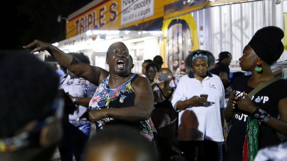 PHOTO: Alton Sterling's aunt Veda Washington-Abusaleh speaks to community members during a vigil at the Triple S Food Mart, in Baton Rouge, Louisiana, on May 2, 2017.
