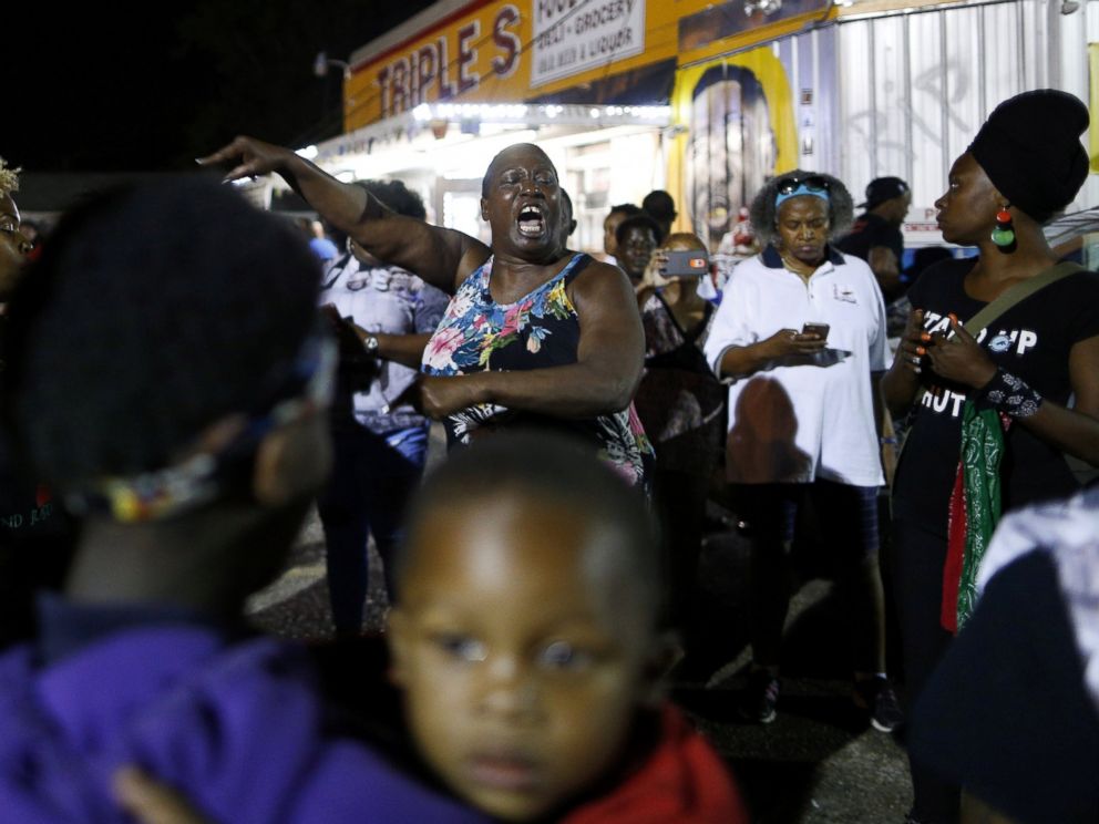 PHOTO: Alton Sterlings aunt Veda Washington-Abusaleh speaks to community members during a vigil at the Triple S Food Mart, in Baton Rouge, Louisiana, on May 2, 2017.
