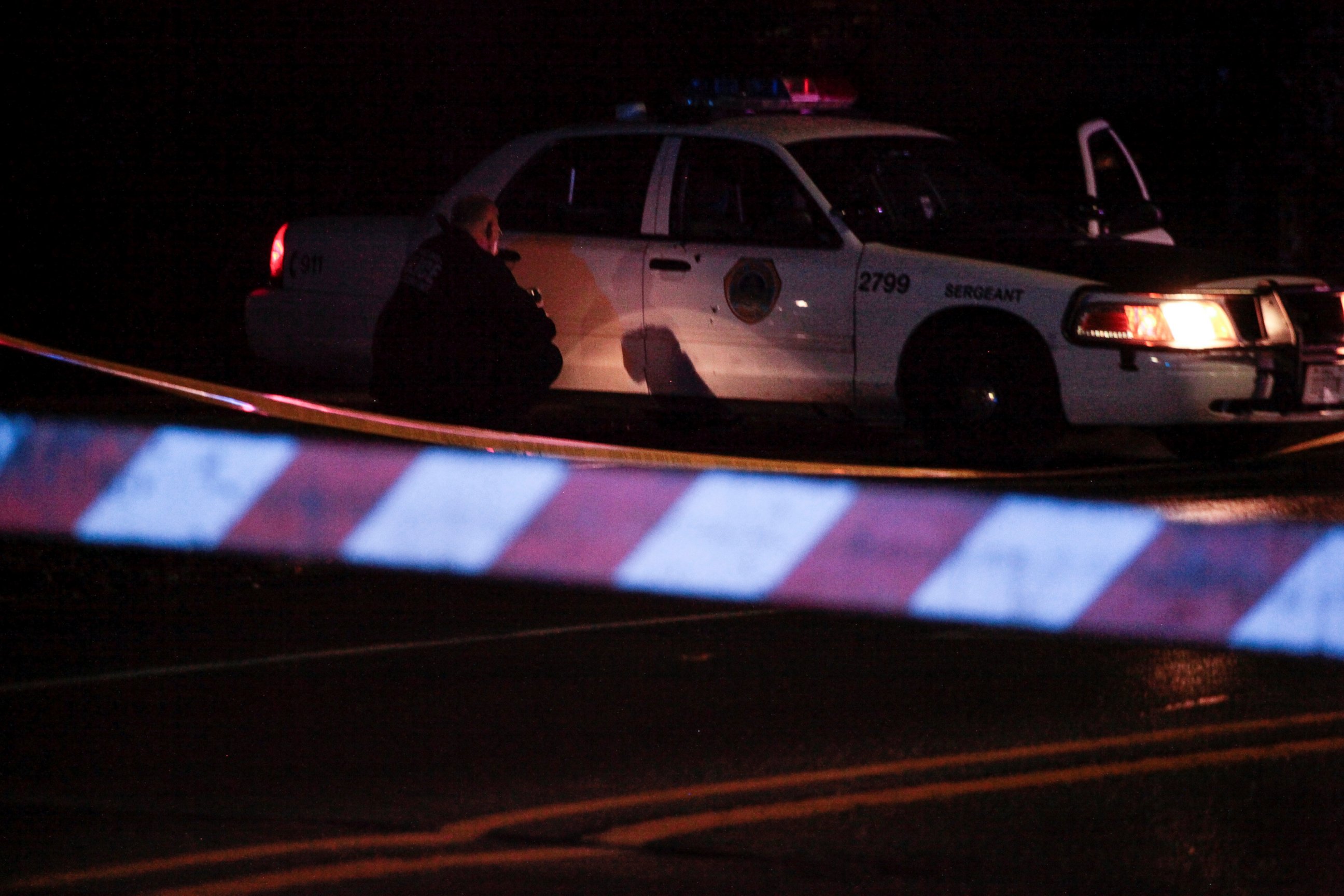 PHOTO: A police photographer is seen after two police officers were shot and killed in separate attacks described as "ambush-style" in Des Moines, Iowa, Nov. 2, 2016. 