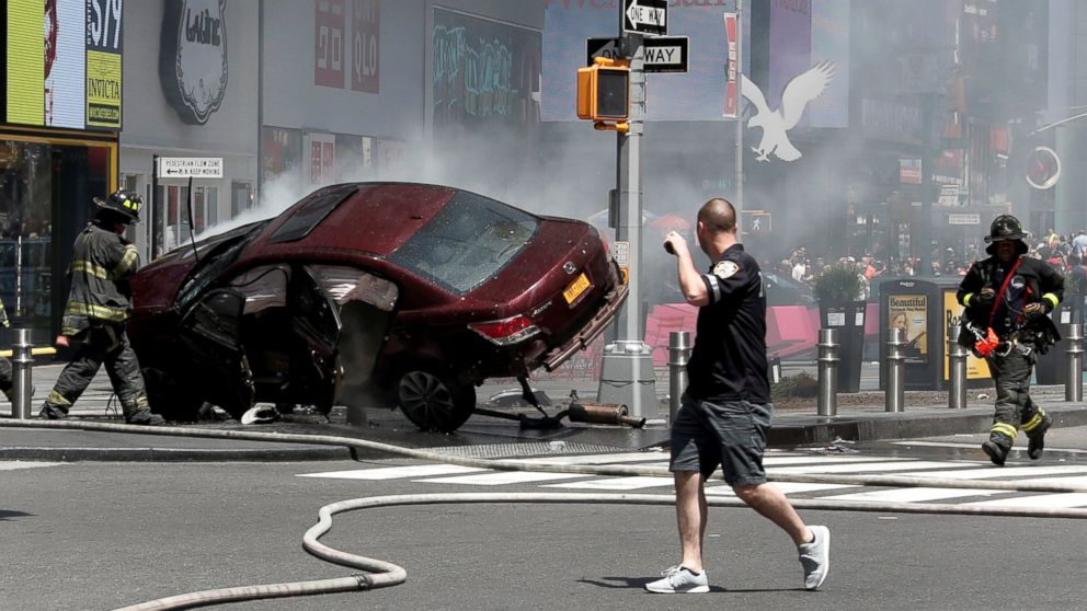 PHOTO: A vehicle that struck pedestrians and later crashed is seen on the sidewalk in Times Square in New York City, May 18, 2017.