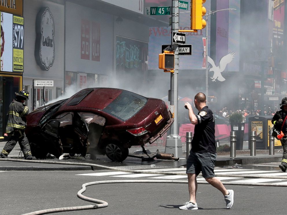 PHOTO: A vehicle that struck pedestrians and later crashed is seen on the sidewalk in Times Square in New York City, May 18, 2017.