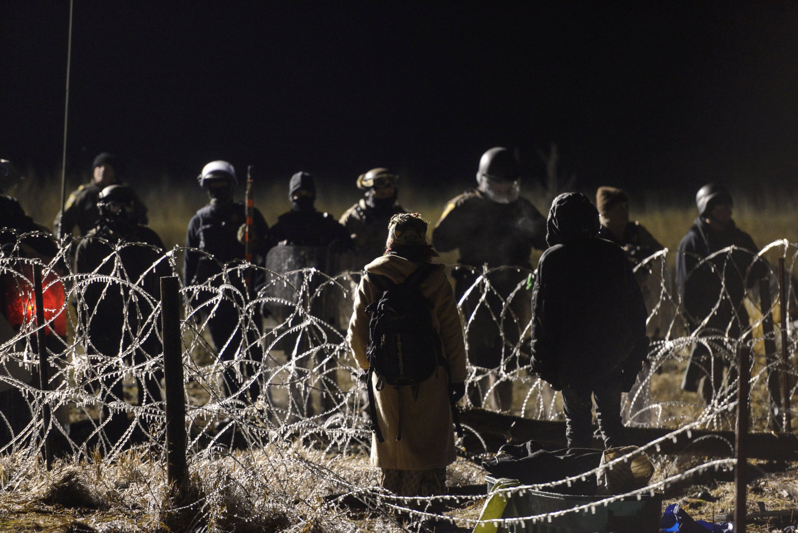 PHOTO: Protesters stand off with police during a protest against plans to pass the Dakota Access pipeline near the Standing Rock Indian Reservation, North Dakota, Nov. 20, 2016.