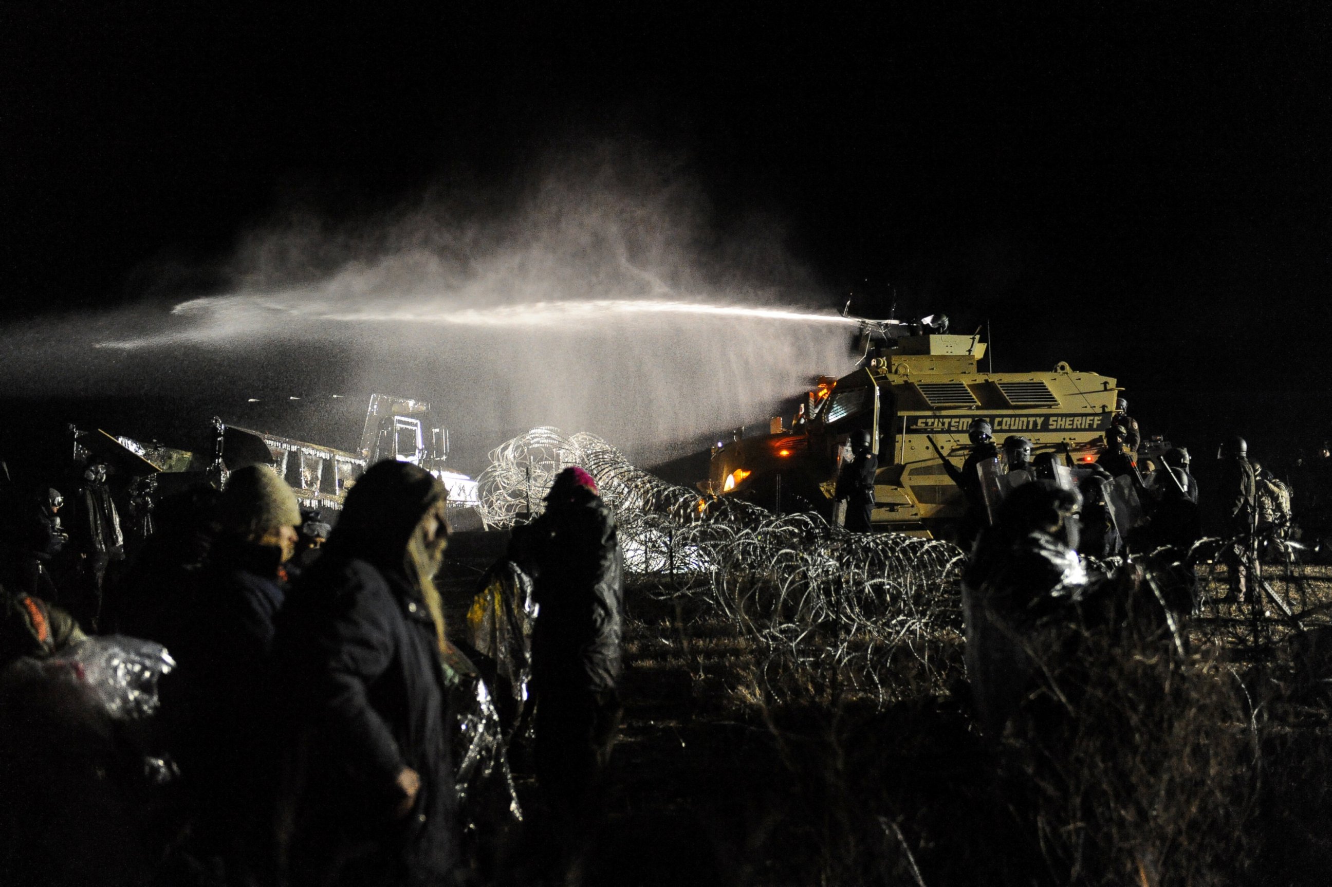 PHOTO: Police use a water cannon on protesters during a protest against plans to pass the Dakota Access pipeline near the Standing Rock Indian Reservation, North Dakota, Nov. 20, 2016.