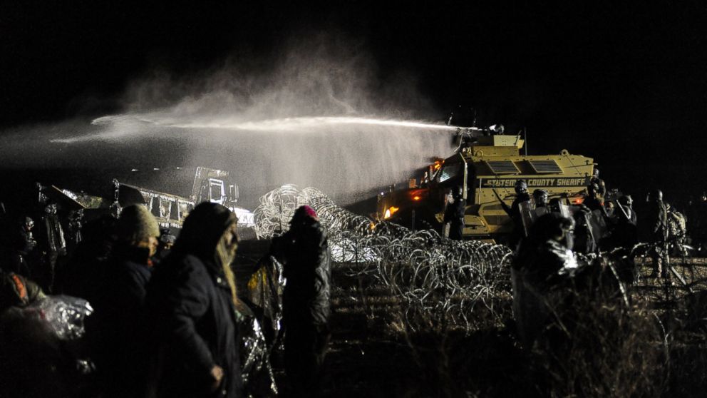 PHOTO: Police use a water cannon on protesters during a protest against plans to pass the Dakota Access pipeline near the Standing Rock Indian Reservation, North Dakota, Nov. 20, 2016.