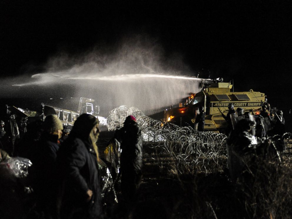 PHOTO: Police use a water cannon on protesters during a protest against plans to pass the Dakota Access pipeline near the Standing Rock Indian Reservation, North Dakota, Nov. 20, 2016.