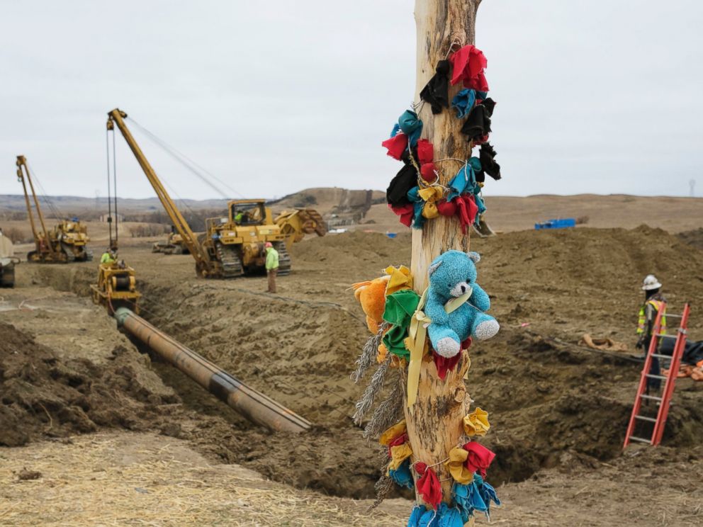 PHOTO: A log adorned with colorful decorations remains at a Dakota Access Pipeline protest encampment as construction work continues on the pipeline near the town of Cannon Ball, North Dakota, Oct. 30, 2016.