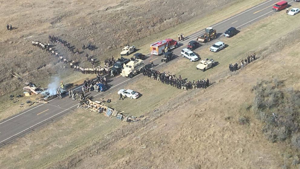 PHOTO: Protesters against the Dakota Access Pipeline stand-off with police in this aerial photo of Highway 1806 and County Road 134 near the town of Cannon Ball, North Dakota, Oct. 27, 2016.