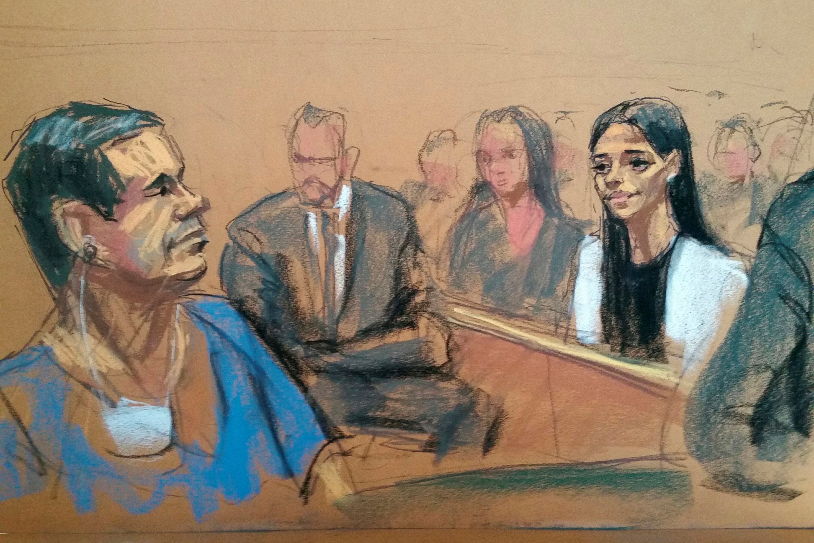 PHOTO: Joaquin "El Chapo" Guzman smiles at his wife, Emma Coronel, in a sketch of a court appearance at the Brooklyn Federal Courthouse in Brooklyn, New York, May 5, 2017.