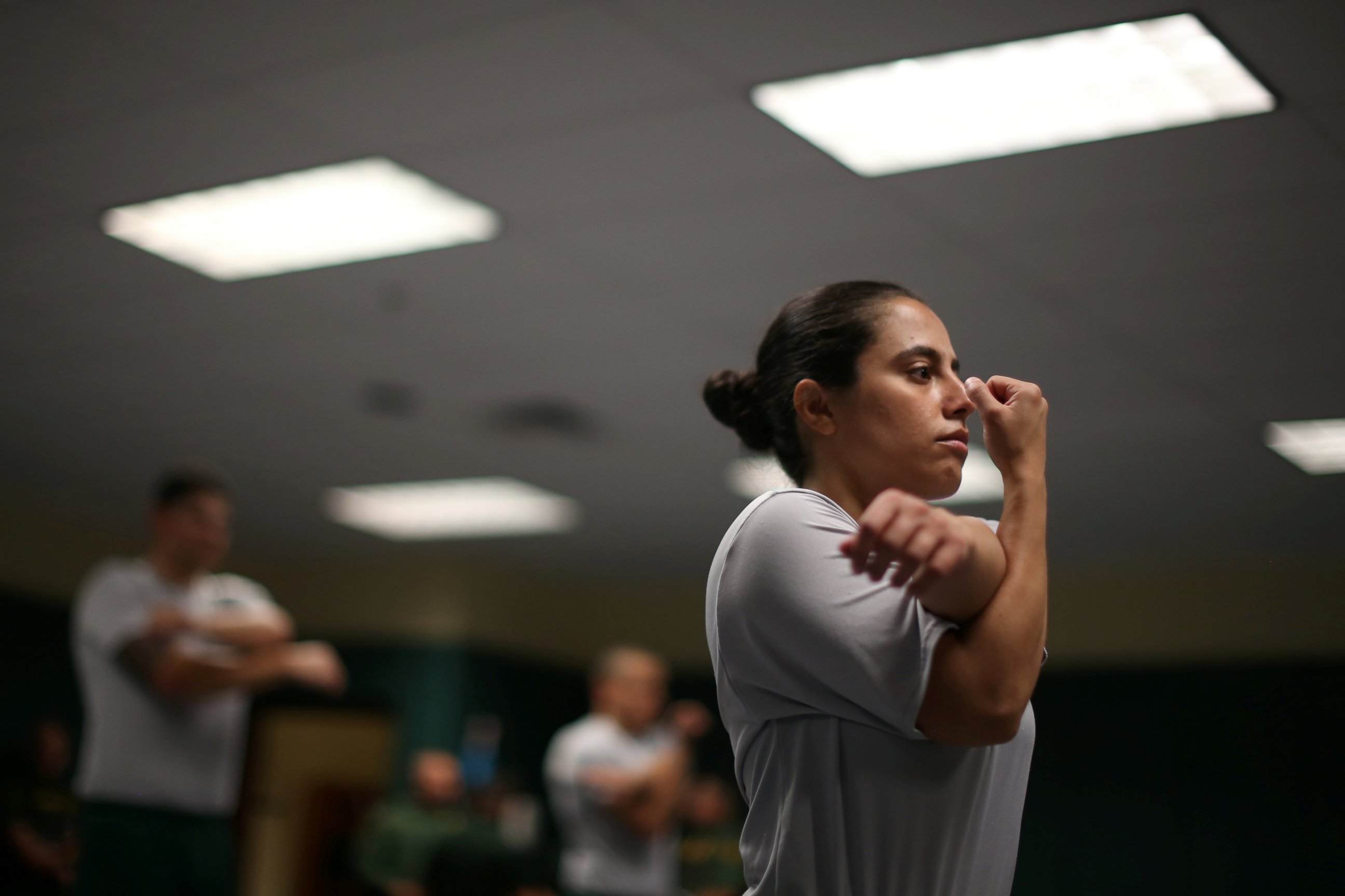 PHOTO: Border patrol trainee Stevany Shakare, from Iraq, takes part in a physical training class at the United States Border Patrol Academy in Artesia, New Mexico, June 8, 2017.