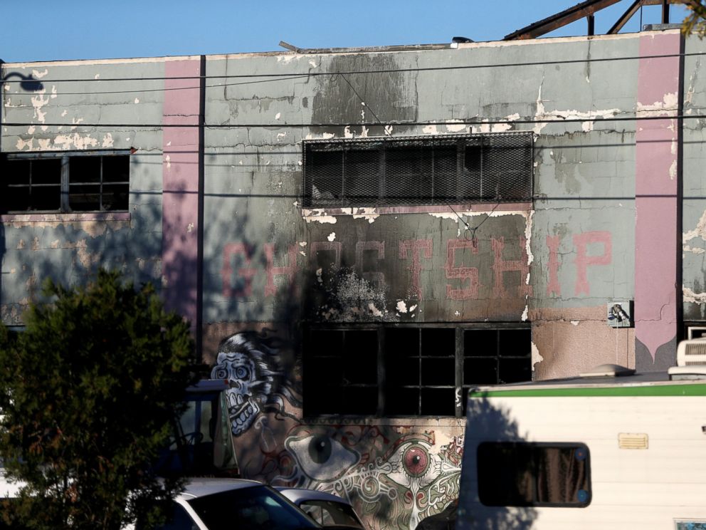 PHOTO: A charred wall is seen outside a warehouse after a fire broke out during an electronic dance party late Friday evening, resulting in at least nine deaths and many unaccounted for in Oakland, California, Dec. 3, 2016.