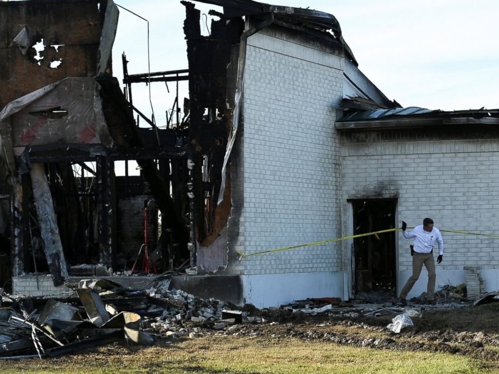 PHOTO: A security official investigates the aftermath of a fire at the Victoria Islamic Center mosque in Victoria, Texas Jan. 29, 2017.