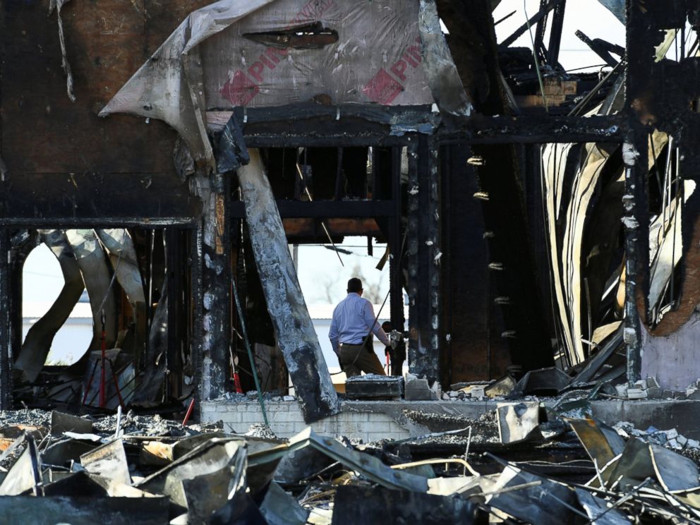 PHOTO: A security official investigates the aftermath of a fire at the Victoria Islamic Center mosque in Victoria, Texas Jan. 29, 2017.