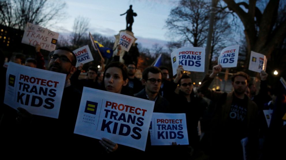 Transgender activists and supporters protest potential changes by the Trump administration in federal guidelines issued to public schools in defense of transgender student rights, near the White House in Washington, U.S. February 22, 2017.