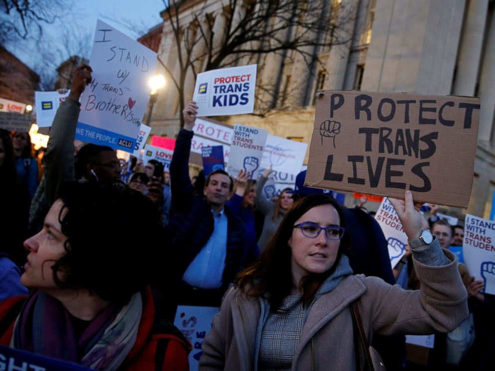 PHOTO: Transgender activists and supporters protest potential changes by the Trump administration in federal guidelines issued to public schools in defense of transgender student rights, near the White House in Washington, Feb. 22, 2017.