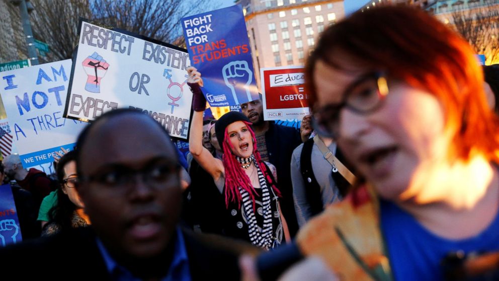 PHOTO: Transgender activists and supporters protest potential changes by the Trump administration in federal guidelines issued to public schools in defense of transgender student rights, near the White House in Washington, Feb. 22, 2017.