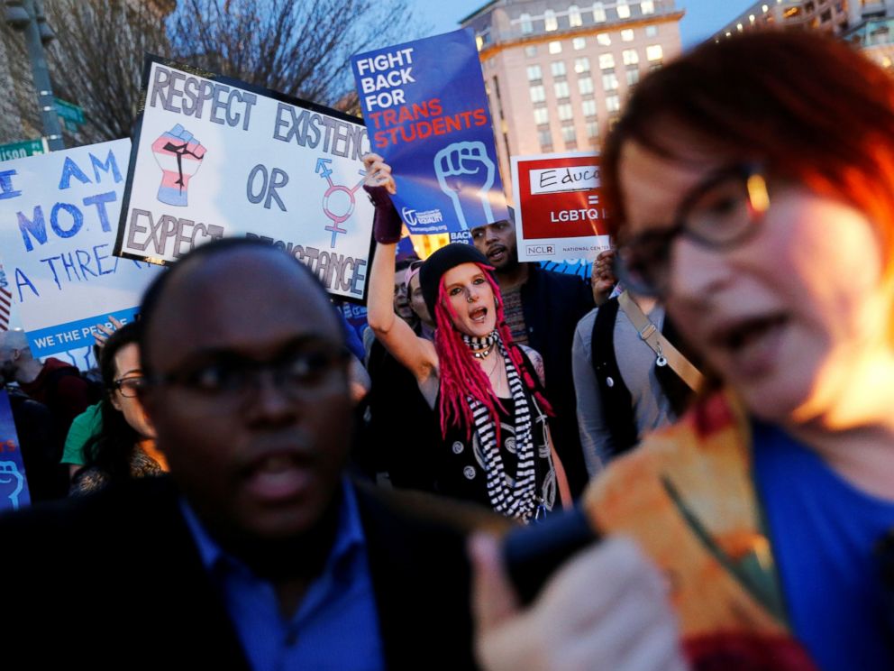 PHOTO: Transgender activists and supporters protest potential changes by the Trump administration in federal guidelines issued to public schools in defense of transgender student rights, near the White House in Washington, Feb. 22, 2017.