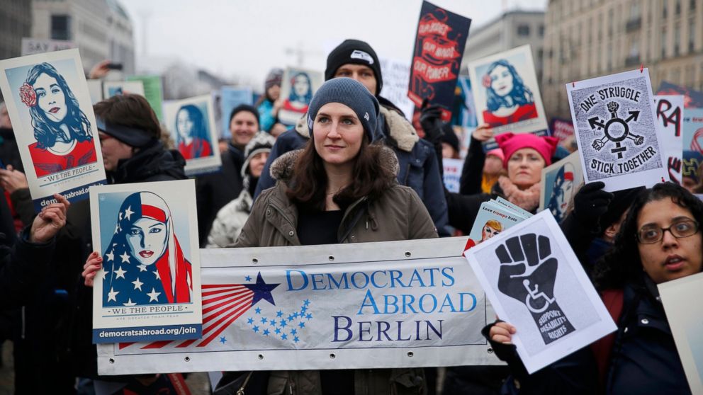 PHOTO: People gather in front of the U.S. Embassy on Pariser Platz beside Brandenburg Gate in solidarity with the Women's March in Washington and around the world, in Berlin, Germany, Jan. 21, 2017.  