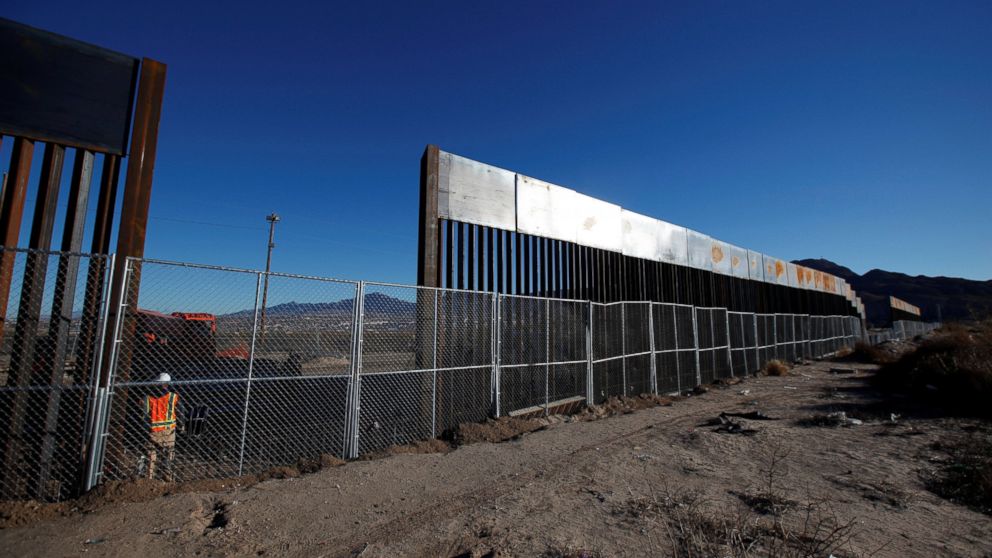 PHOTO: A worker stands next to a newly built section of the U.S.-Mexico border fence at Sunland Park, U.S. opposite the Mexican border city of Ciudad Juarez, Mexico January 25, 2017. Picture taken from the Mexico side of the U.S.-Mexico border. 