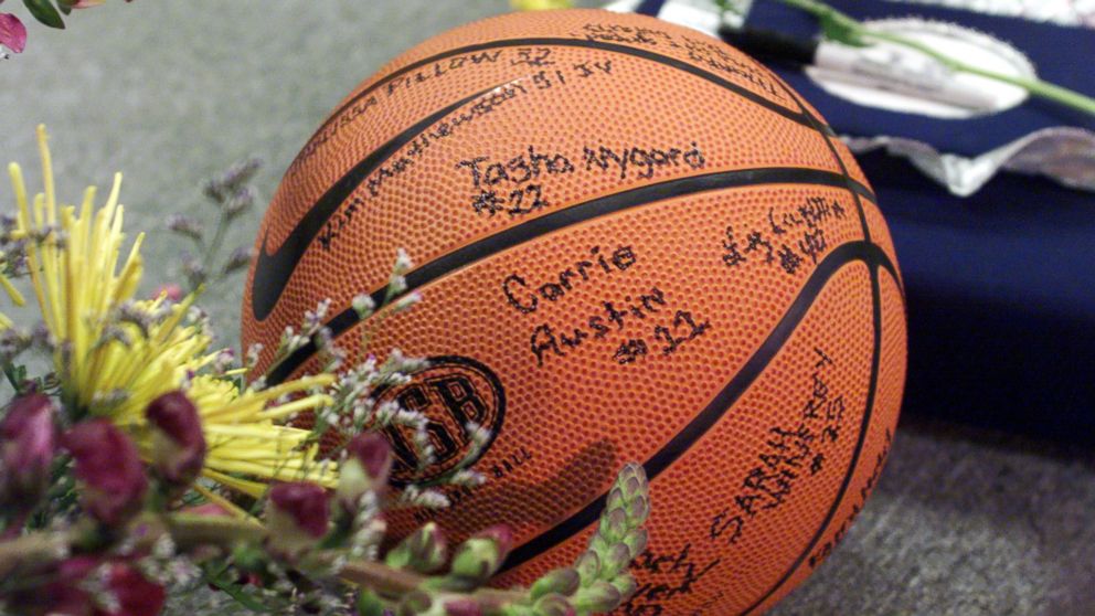 PHOTO: A basketball signed by the Columbine girls' team sits near Dave Sanders' casket April 26, 1999 prior to the start of the teacher's funeral service in Littleton, Colo. 
