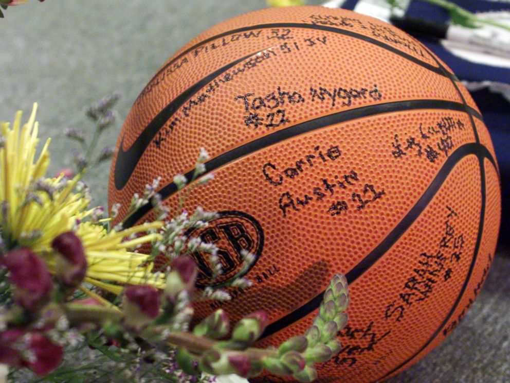 PHOTO: A basketball signed by the Columbine girls' team sits near Dave Sanders' casket April 26, 1999 prior to the start of the teacher's funeral service in Littleton, Colo. 
