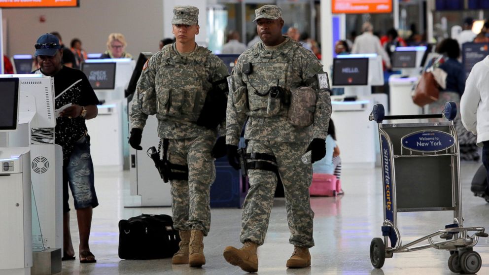 Members of the U.S. Army monitor the departures area at John F. Kennedy international Airport in New York,  June 29, 2016. 