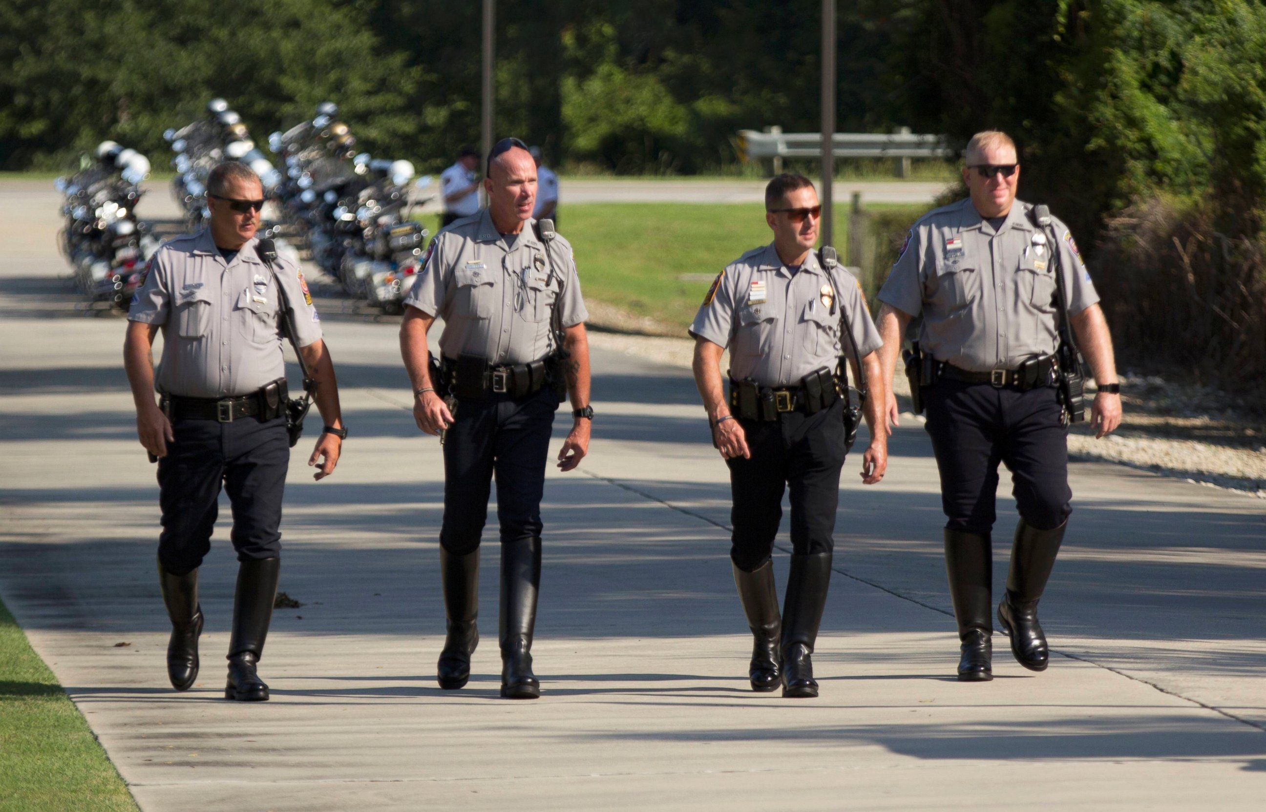 PHOTO: Motorcycle patrolmen arrive to the funeral services for police officer Matthew Gerald, one of three officers killed by a gunman on July 17, at Healing Place Church in Baton Rouge, Louisiana, July 22, 2016.  