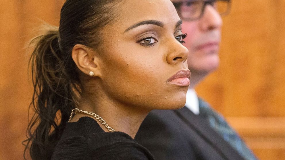 Shayanna Jenkins, the fiancee of former New England Patriots Aaron Hernandez, listens during his murder trial at the Bristol County Superior Court in Fall River, Mass., Feb. 25, 2015.