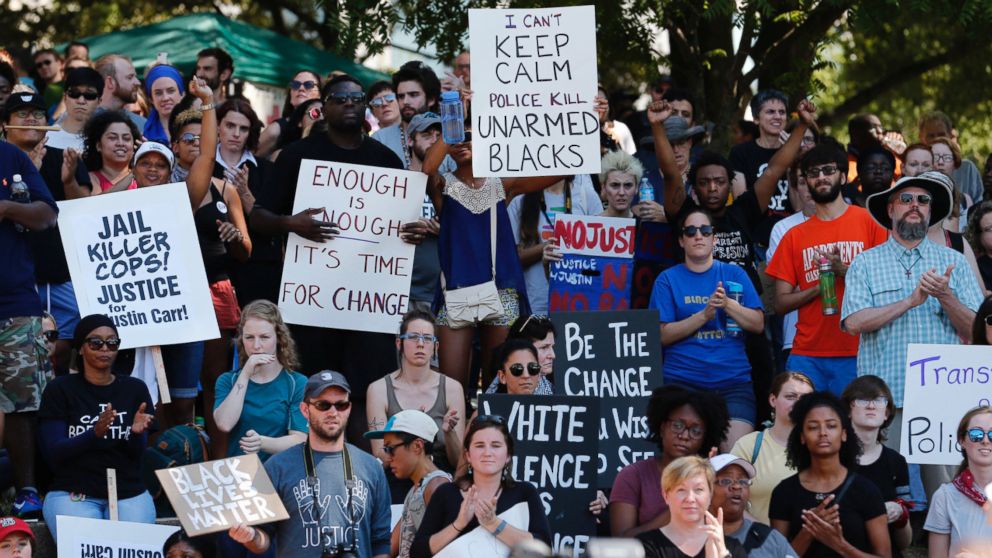 PHOTO: People cheer at a rally at Marshall Park to protest the police shooting of Keith Scott, in Charlotte, North Carolina, Sept. 24, 2016.