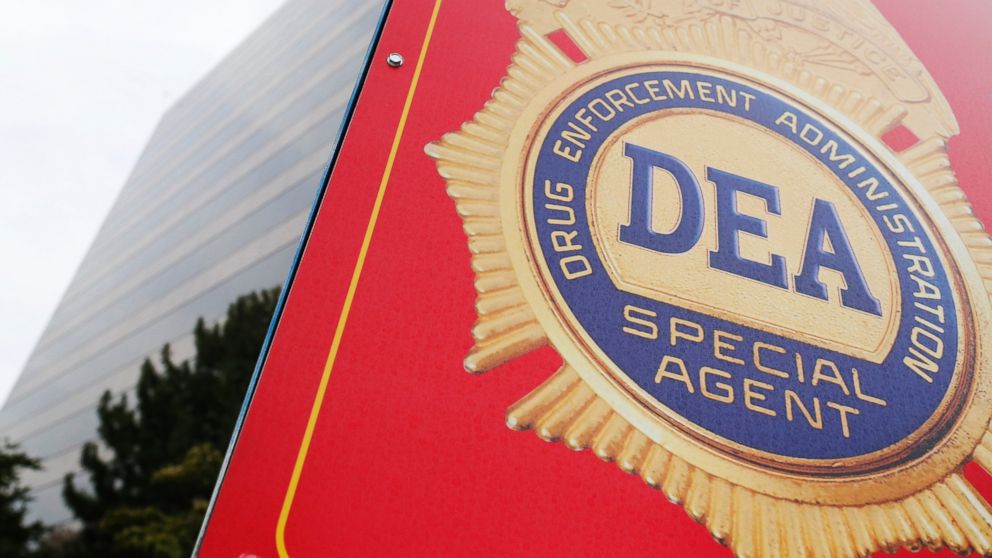A sign with a DEA badge marks the entrance to the U.S. Drug Enforcement Administration (DEA) Museum in Arlington, Va., Aug. 8, 2013.