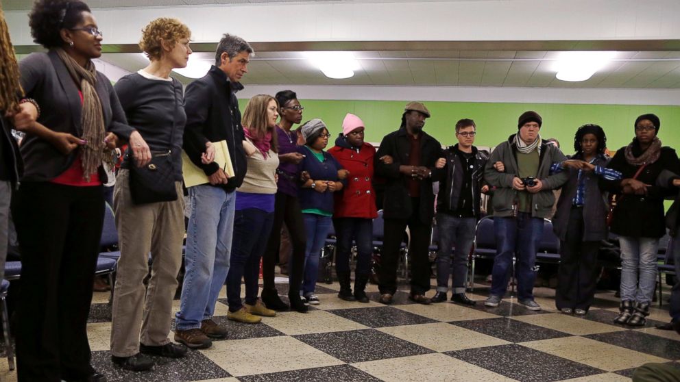 PHOTO: Participants link arms during a training session on how to hold a non-violent and peaceful demonstration, in preparation for the verdict by a Missouri grand jury on the fatal shooting of Michael Brown in St. Louis, Mo., Nov. 12, 2014. 