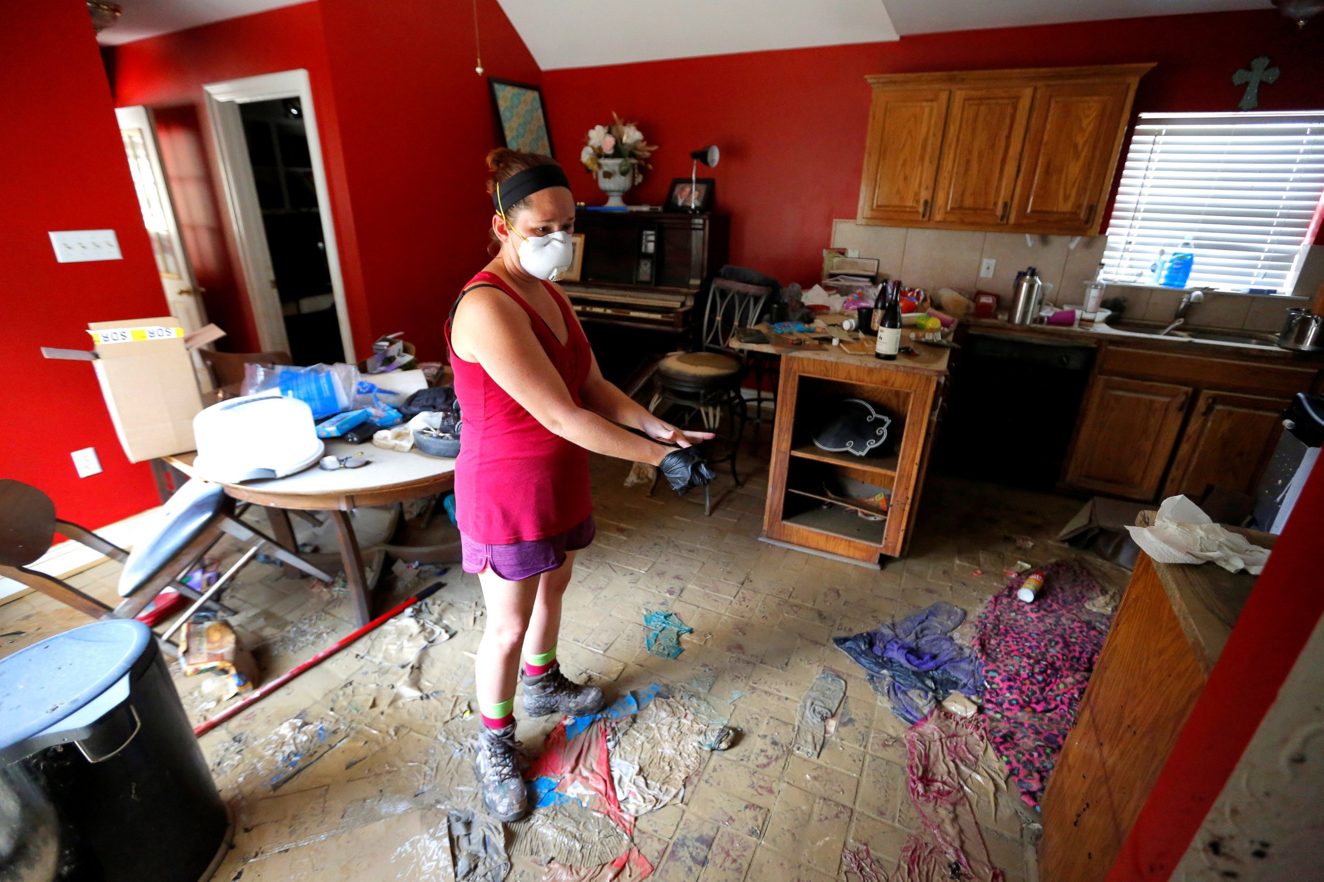 PHOTO: Johnette Folse stands in her flood damaged kitchen in Denham Springs, Louisiana, Aug. 16, 2016. 