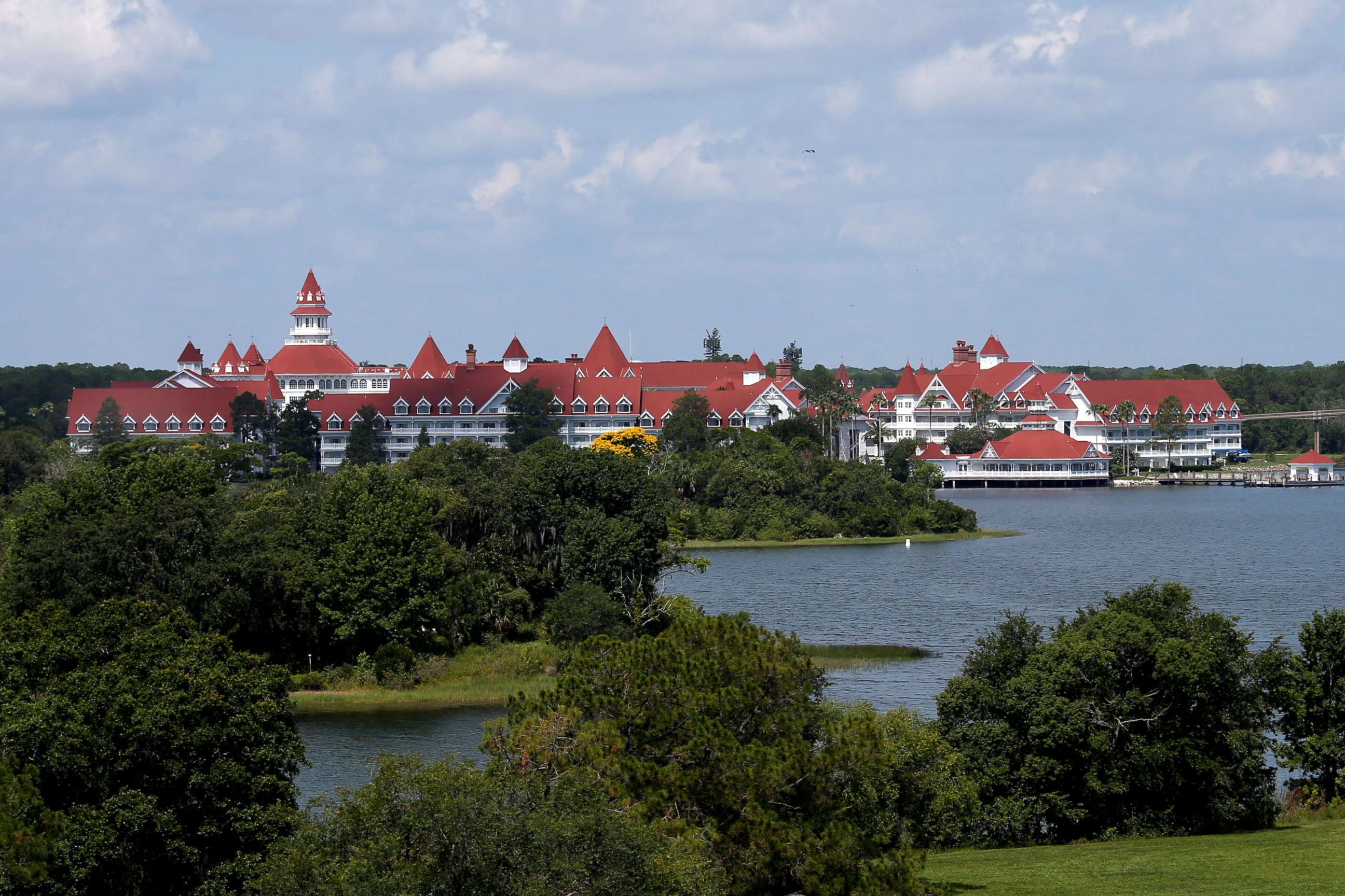 PHOTO: The Grand Floridian in the background as as police hunted for signs of a two-year-old boy who was dragged by an alligator into the lagoon at the Walt Disney World resort in Orlando, Fla., June 15, 2016. 