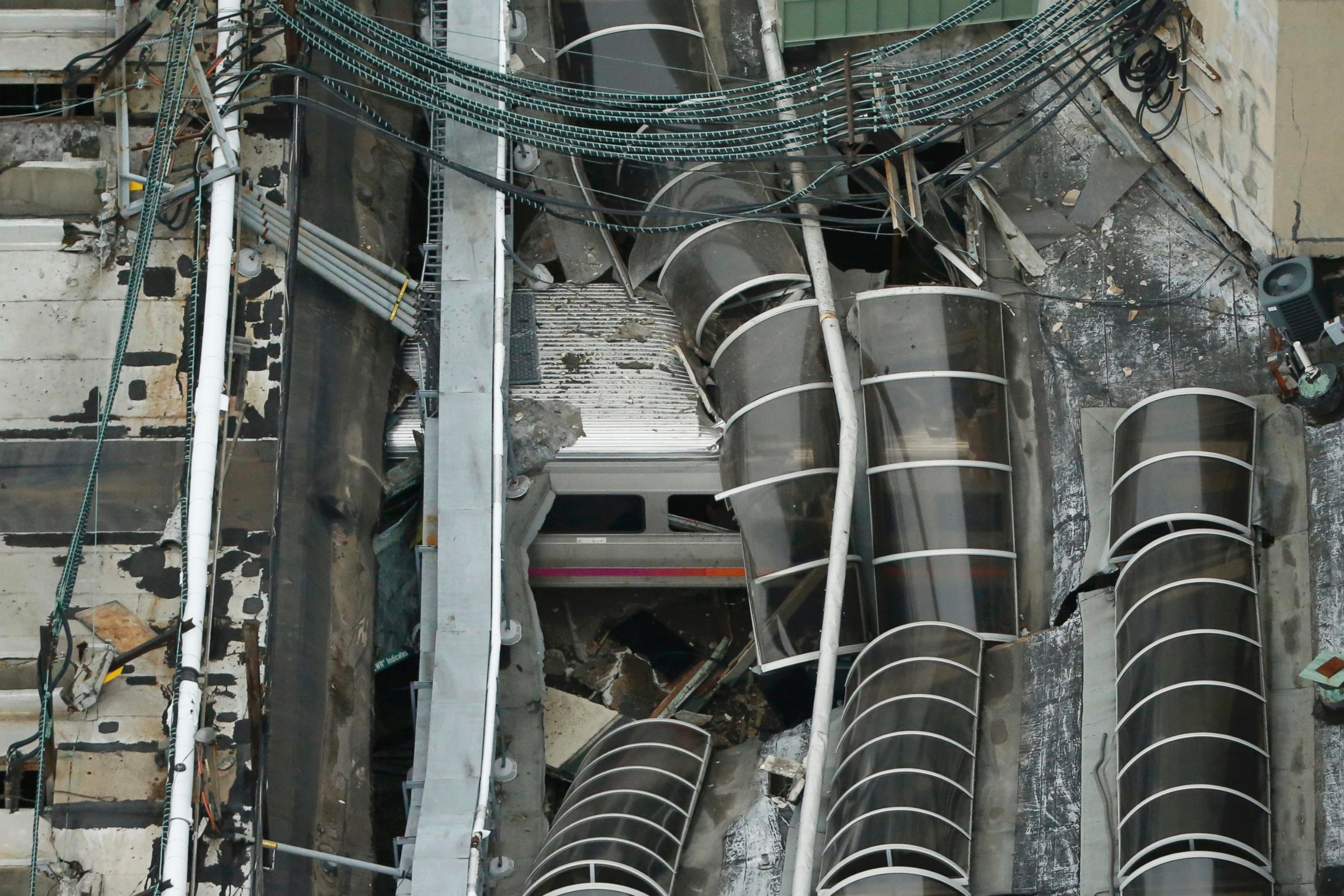 PHOTO: A derailed New Jersey Transit train is seen under a collapsed roof after it derailed and crashed into the station in Hoboken, New Jersey, Sept. 29, 2016.